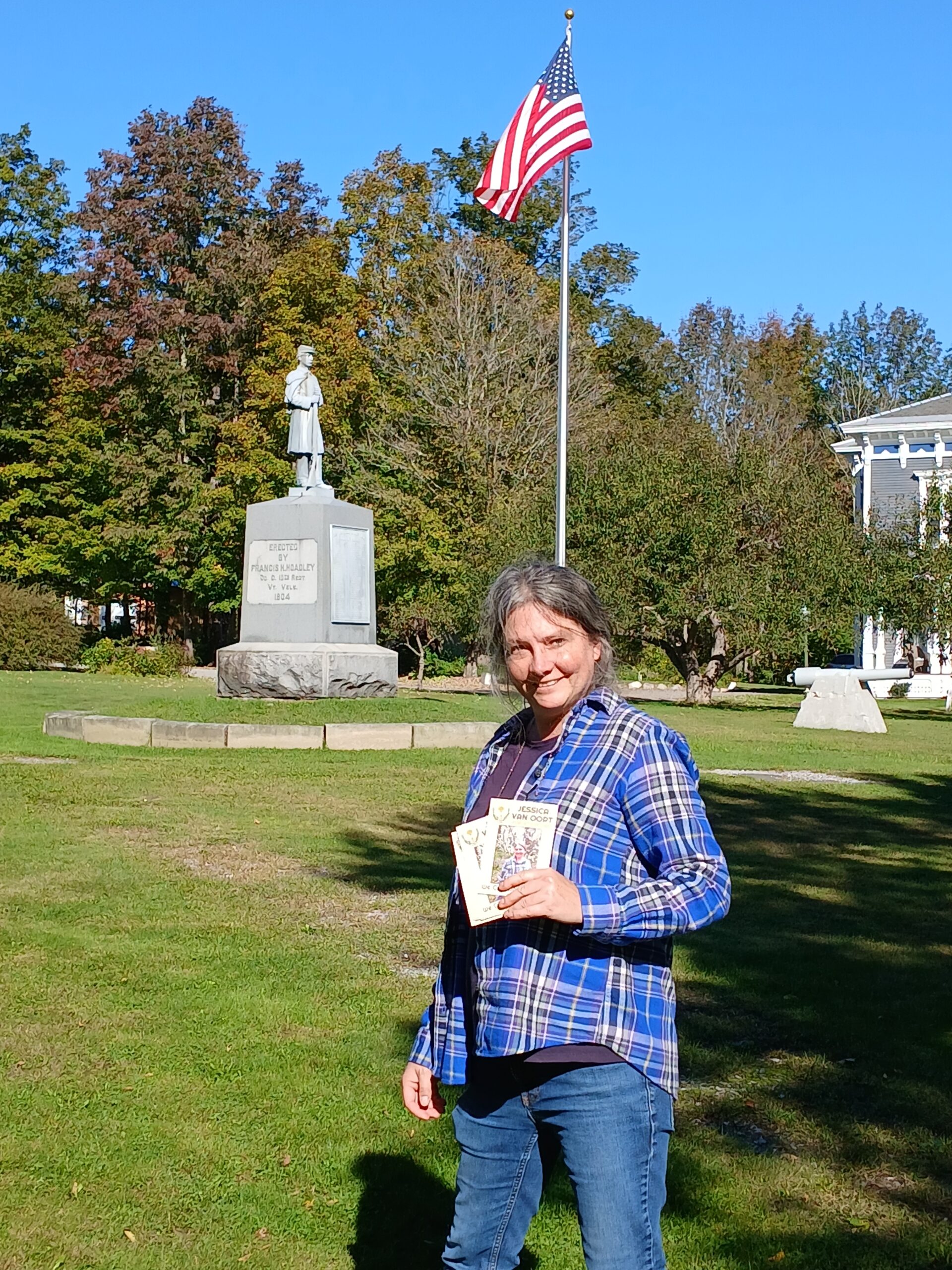 Jessica on the green in Middletown Springs with flyers